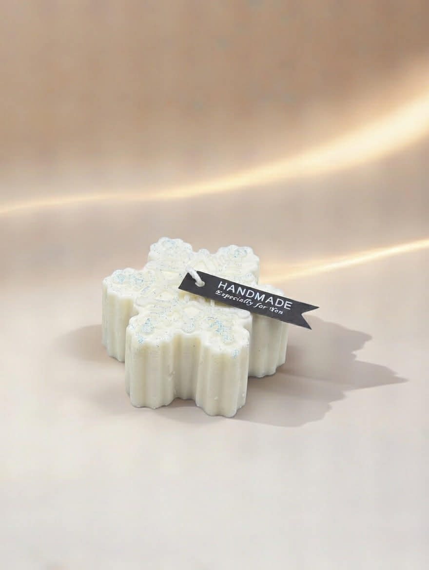 duftkerze schneeflocken